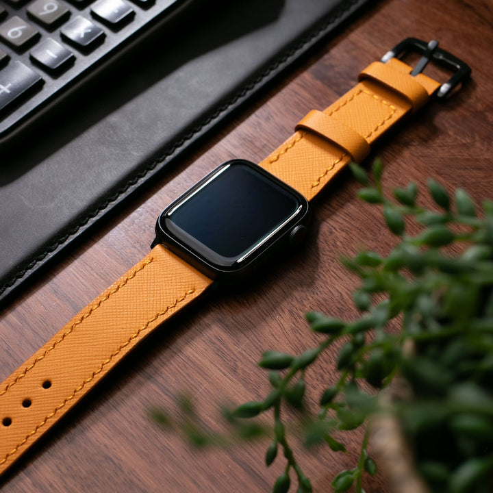 Saffiano deri apple watch kayış, turuncu renkte, şık ve dayanıklı tasarıma sahip