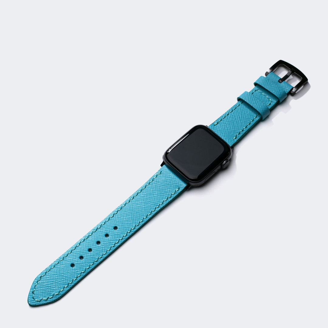 Mavi Roarstraps saffiano deri apple watch kayış, şık ve dayanıklı tasarımıyla dikkat çekiyor.