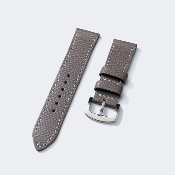 Roarstraps Saffiano deri saat kayışı, şık gri rengiyle zarif bir görünüm sunar.