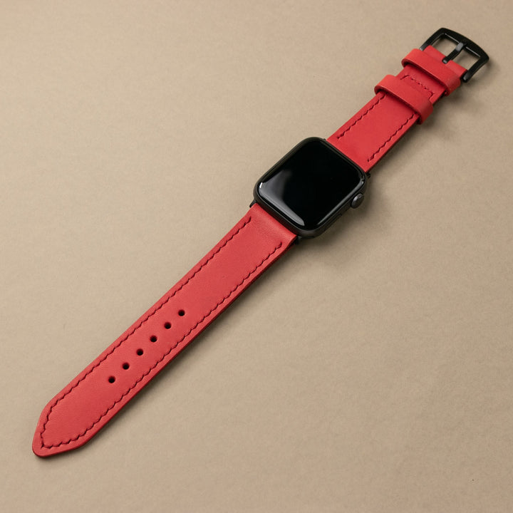 Kırmızı el yapımı deri apple watch kayışı, şık tasarımıyla saatlerinizi tamamlar.